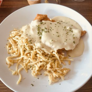 Biergarten - Chicken schnitzel with cream gravy and a side of spätzle - Wine Bars Near Me - Tucson, Arizona Biergarten - Chicken schnitzel with cream gravy and a side of spätzle - Wine Bars Near Me - Tucson, Arizona