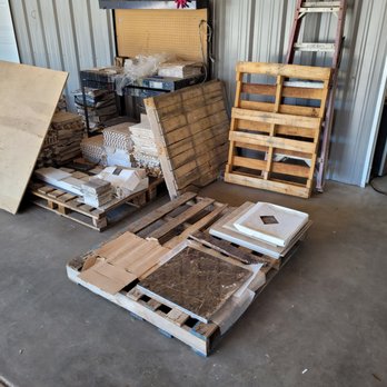 Texas Tile Liquidators - a pile of wood pallets - Flooring Near Me - Cleveland, Texas
