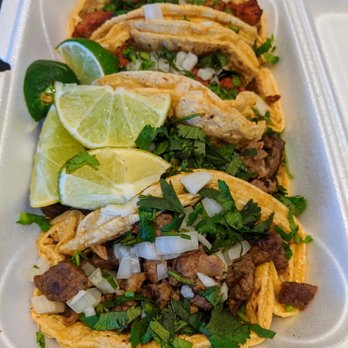 Mercado Acapulco - Pastor (marinated grilled pork) and ssada (steak) tacos. $2 each. - Mexican Near Me - Atlanta, Georgia