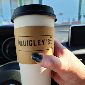 Quigley's Cafe - a hand holding a cup of coffee - Coffee & Tea Near Me - Rochester, New York Quigley's Cafe - a hand holding a cup of coffee - Coffee & Tea Near Me - Rochester, New York