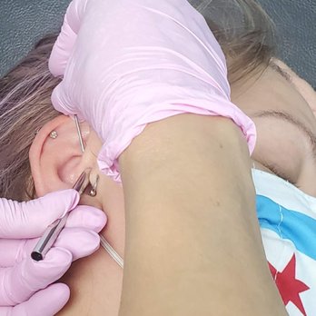 Chicago Ink Tattoo & Body Piercing - Rossmery finishing up my Daith piercing - Piercing Near Me - Chicago, Illinois Chicago Ink Tattoo & Body Piercing - Rossmery finishing up my Daith piercing - Piercing Near Me - Chicago, Illinois