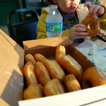 Southern Maid Donuts - a child eating a donut - Donuts Near Me - Shreveport, Louisiana Southern Maid Donuts - a child eating a donut - Donuts Near Me - Shreveport, Louisiana