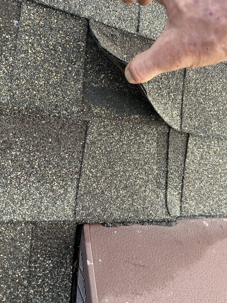 Slide of New Vallee Roofing