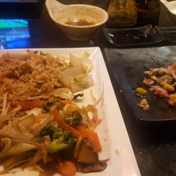 Veggie hibachi and remaining pieces of a flamingo roll Veggie hibachi and remaining pieces of a flamingo roll