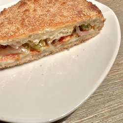New York  Pizzeria - 10" calzone filled with mozzarella cheese and ricotta. Added mushrooms, pepperoni, bell peppers and onions for $1.50 each.