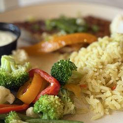 Two Trees Restaurant & Taps - Almond-crusted Sea Bass with rice pilaf and steamed vegetables.