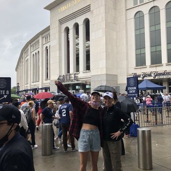 Yankee Twin Eatery Bar - a couple taking a selfie - Sports Bars Near Me - Bronx, New York