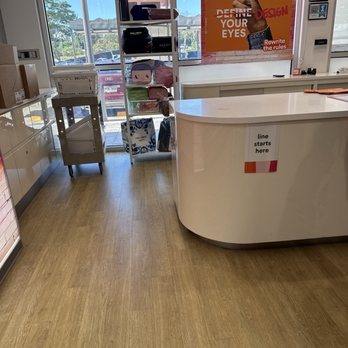 Ulta Beauty - Tiny sign hidden off to the side behind shelves and bags to tell you WHERE the line starts - Cosmetics & Beauty Supply Near Me - Pearl City, Hawaii Ulta Beauty - Tiny sign hidden off to the side behind shelves and bags to tell you WHERE the line starts - Cosmetics & Beauty Supply Near Me - Pearl City, Hawaii