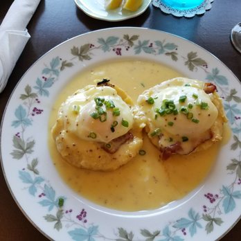 The Southerner - Full order of Benedict in that lovely sea of hollandaise sauce. - Southern Near Me - Saugatuck, Michigan