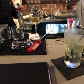 Yamazaru - Shots of the spilled water Gus never cleaned up. And the water glass Gus never even offered to refill. Very disrespectful and disappointing. - Sushi Bars Near Me - Charlotte, North Carolina