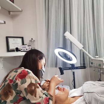L'Brows Studio - Practicing on a real model during the lash extension training - Cosmetology Schools Near Me - Fountain Valley, California L'Brows Studio - Practicing on a real model during the lash extension training - Cosmetology Schools Near Me - Fountain Valley, California