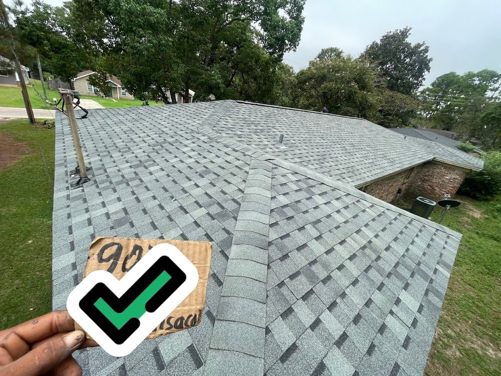 Slide of H.E. Roberts Roofing