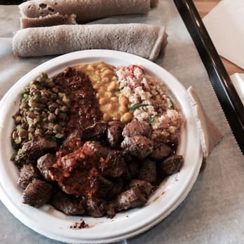 Nazrawi Ethiopian Restaurant  - Lamb tibs with interesting and tasty non-traditional quinoa salad! Yummy! - Ethiopian Near Me - Silver Spring, Maryland