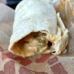 Taco John's - Nacho Crunch Chicken Burrito oozes cheese when bitten. Think Ozzy, but the bat is a cheese burritos!