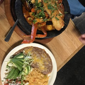 La Cabaña - two plates of food on a table - Seafood Near Me - Lincoln, Nebraska La Cabaña - two plates of food on a table - Seafood Near Me - Lincoln, Nebraska
