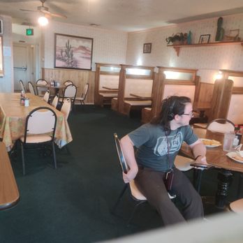 Budget Cafe - a man sitting at a table eating - Cafes Near Me - Lompoc, California