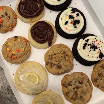 Crumbl - Madison - lemon glaze, oreo birthday cake, reese's pieces, chocolate chip, and chocolate cake - Bakeries Near Me - Madison, Wisconsin Crumbl - Madison - lemon glaze, oreo birthday cake, reese's pieces, chocolate chip, and chocolate cake - Bakeries Near Me - Madison, Wisconsin
