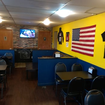 Fat Shack - Cozy dining area! - Burgers Near Me - Greeley, Colorado