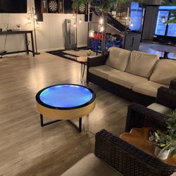 Laughing Lion Herbs - Relaxing lounge seating beside our illuminated sand table.