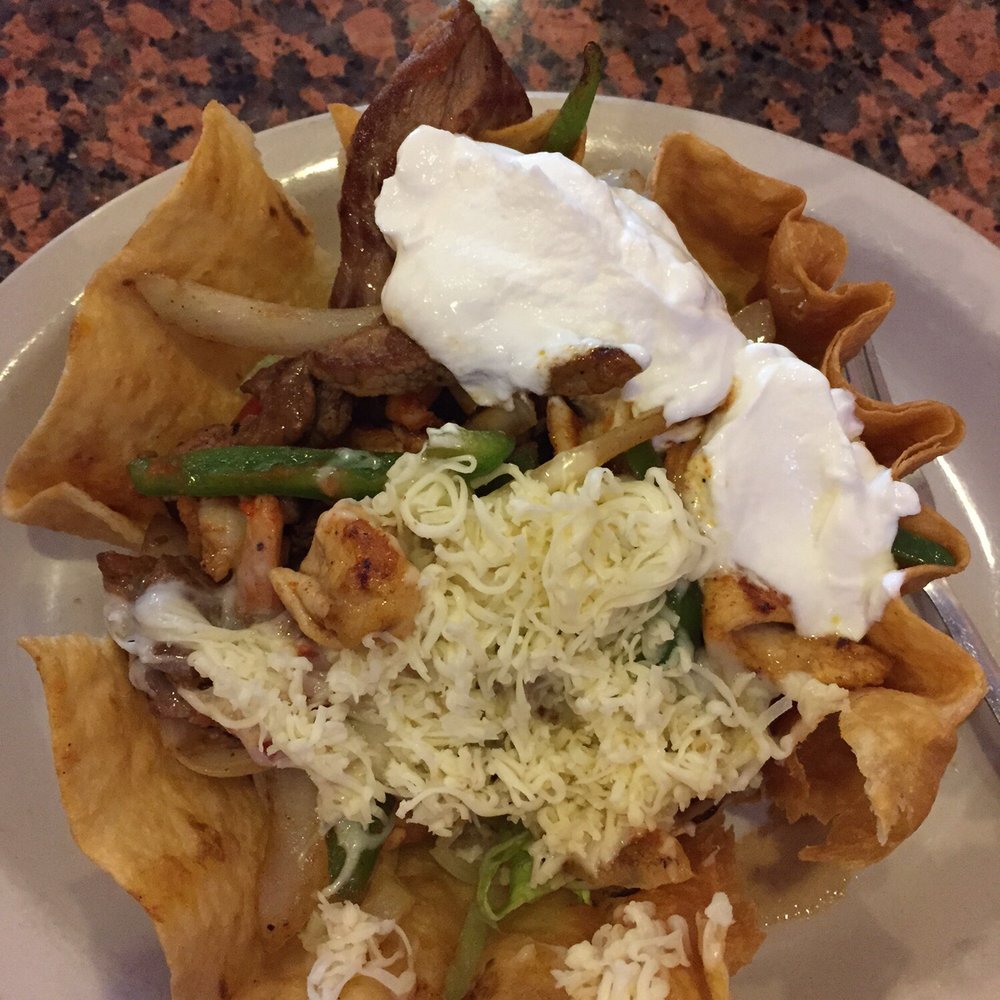 El Morelia - Texas fajita taco salad full of shrimp, steak strips and chicken with other goodies. - Mexican Near Me - Bremen, Georgia El Morelia - Texas fajita taco salad full of shrimp, steak strips and chicken with other goodies. - Mexican Near Me - Bremen, Georgia