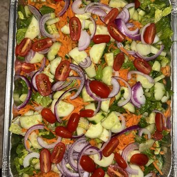 The Shack Jerk Chicken - Large Pan of Garden Salad
A fresh and crisp assortment of garden vegetables, served with The Shack's tangy Balsamic Vinaigrette dressing. - Caterers Near Me The Shack Jerk Chicken - Large Pan of Garden Salad
A fresh and crisp assortment of garden vegetables, served with The Shack's tangy Balsamic Vinaigrette dressing. - Caterers Near Me
