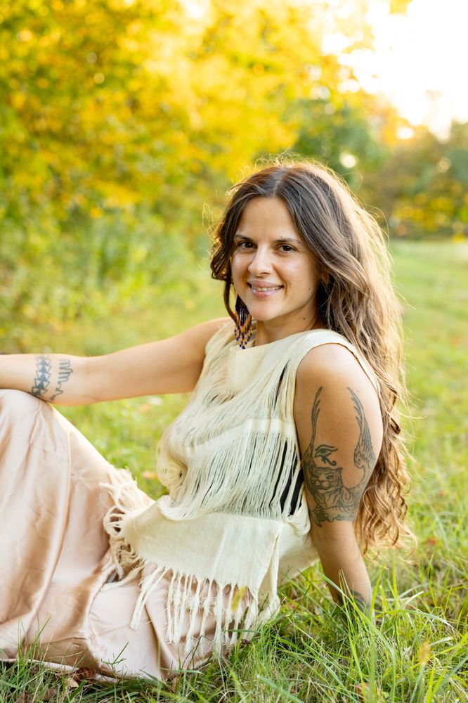 Ancestral Curls Logo