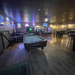 Pool table in the back next to a stage that I will get on if I'm drunk enough :)
