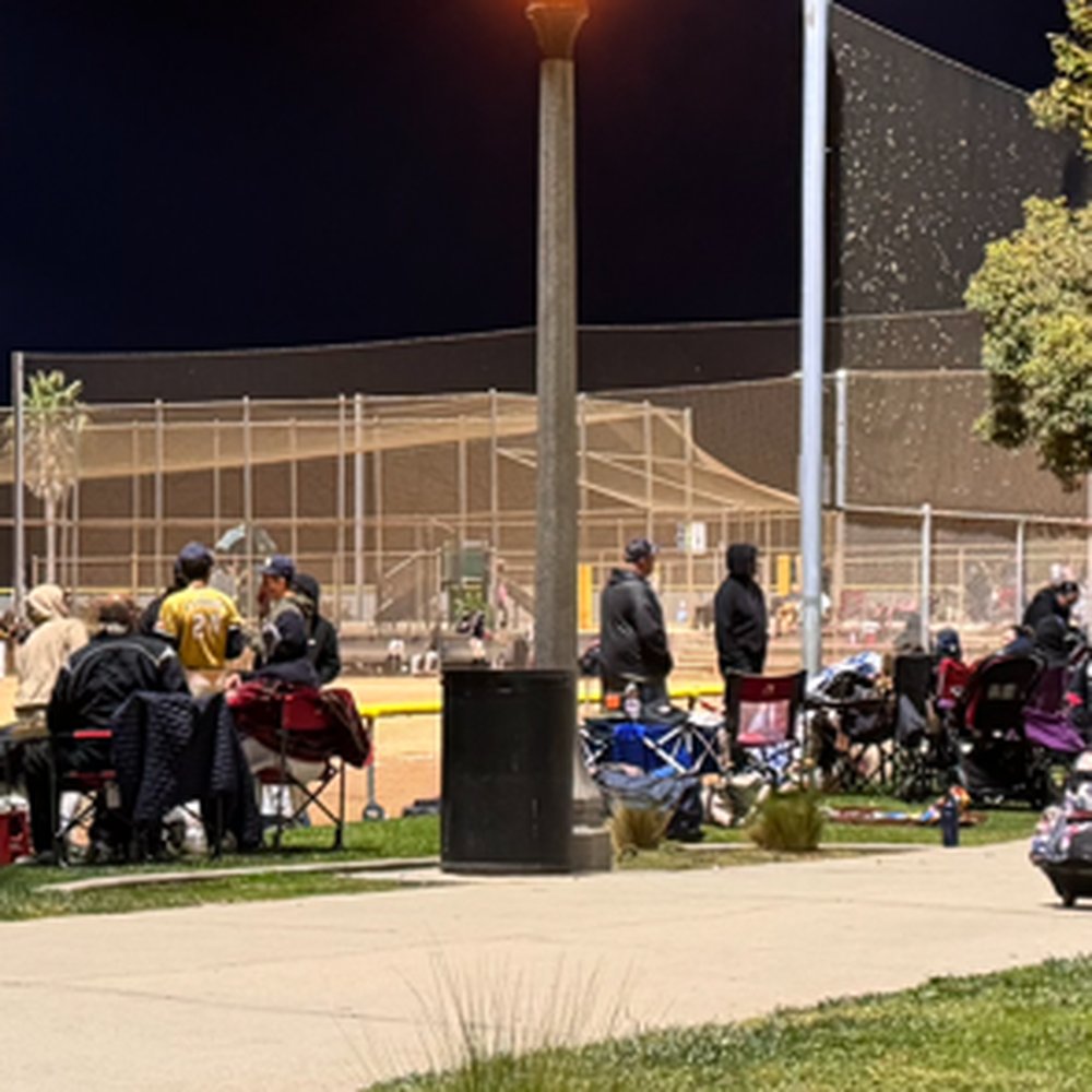 Group, center of pic @ Field 3 of Richard T Steed Park, San Clemente, drinking alcohol & swearing continuously. Elderly & children nearby