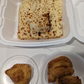 Jonna's Market - Cheese bread and potatoe pierogi - Pizza Near Me - Howell, Michigan