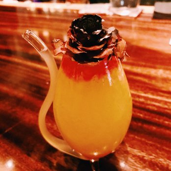 Ruka - The Jesuit, rose is lit with a lighter - Sushi Bars Near Me - Boston, Massachusetts