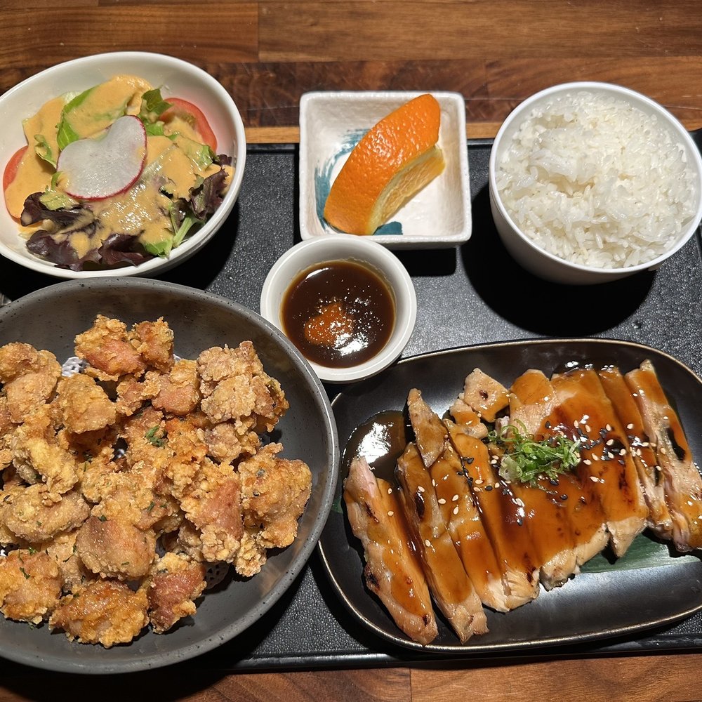 Bento box with sesame chicken and chicken teriyak Bento box with sesame chicken and chicken teriyak