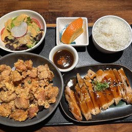 Bento box with sesame chicken and chicken teriyak