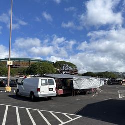 Pg Retailer & Supplier - After a search, found them at the new swap meet layout. Closer to makai side, near the tour bus parking. And by this "4" sign.