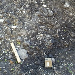 North Shore Handyman - The slab clearly still remains after a week. BTW, our landscaper had it out in a matter of hours using a sledgehammer.