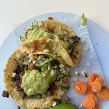 Carmelo's Tacos - Two carne asada tacos with plenty of delicious Salsa Roja (medium) - Mexican Near Me - Seattle, Washington Carmelo's Tacos - Two carne asada tacos with plenty of delicious Salsa Roja (medium) - Mexican Near Me - Seattle, Washington