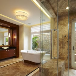 Puma Marble - Bathroom: Materials: Cedar limestone and Black Granite slab material.