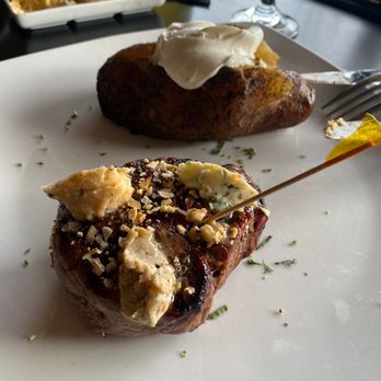 Carnivore - Fillet and baked potato - Steakhouses Near Me - St. Louis, Missouri Carnivore - Fillet and baked potato - Steakhouses Near Me - St. Louis, Missouri
