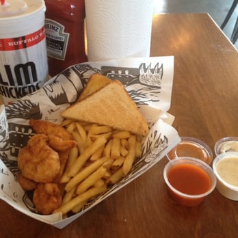 Slim Chickens - Slims plate 5 fries Texas toast. "Hot" and "cayenne ranch" dipping sauce. Very tasty! - Chicken Wings Near Me - Independence, Missouri Slim Chickens - Slims plate 5 fries Texas toast. "Hot" and "cayenne ranch" dipping sauce. Very tasty! - Chicken Wings Near Me - Independence, Missouri
