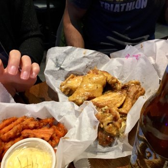 Ray's Original Buffalo Wings - Garlic Parmesan wings & sweet potato fries with honey butter on the side - Burgers Near Me - Omaha, Nebraska Ray's Original Buffalo Wings - Garlic Parmesan wings & sweet potato fries with honey butter on the side - Burgers Near Me - Omaha, Nebraska