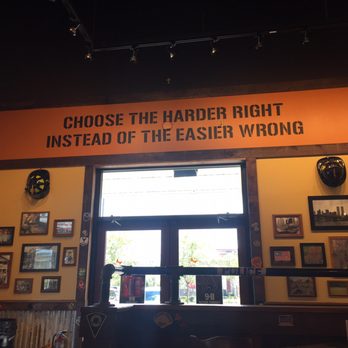Mission BBQ - Saying over main entrance at Mission barbecue. - Barbeque Near Me - Orlando, Florida