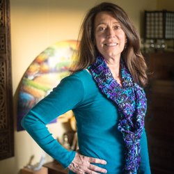 Lora Terres - Boulder Medicine Woman - Lora Terres LAC in her clinic. A comfy, spacious, natural lighting treatment room.