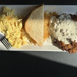 Gaslight District Diner - Chicken fried steak, scrambled eggs, hash browns, and sourdough toast