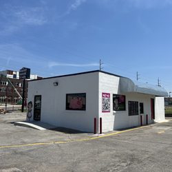 Flos Smokehouse Eats - Outside of Flo's - Seating outside- Parking is a little challenging.