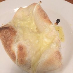 Greens Pizza - Vegan Butter Garlic Bread (topped with vegan cheese we specified we didn't want)