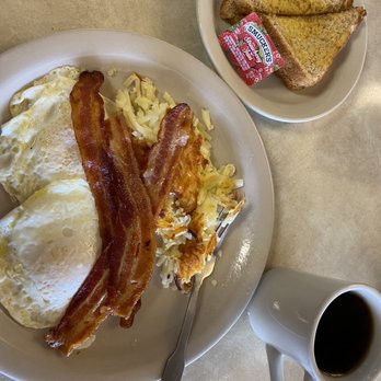 Jim's Restaurants - Two egg breakfast plate. Perfectly crisp bacon and delicious hash browns. - American Near Me - San Antonio, Texas