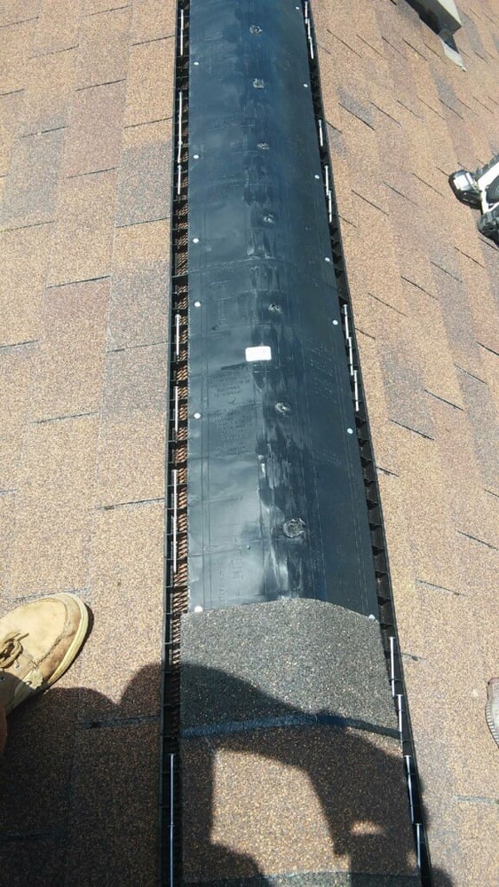 Slide of Austin Roof Man