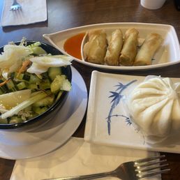 Cuke salad, spring rolls, pork bun
