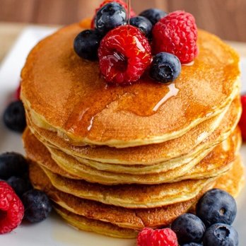 IHOP - Pancakes with syrup and berries. - Breakfast & Brunch Near Me - Kennewick, Washington