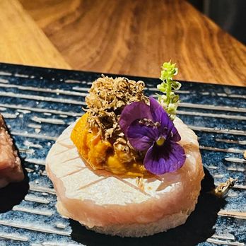 Laughing Monk Cafe - a plate of sushi with a flower on top - Sushi Bars Near Me - Wellesley, Massachusetts Laughing Monk Cafe - a plate of sushi with a flower on top - Sushi Bars Near Me - Wellesley, Massachusetts