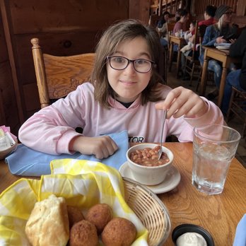 Old Mill Restaurant - Those hush puppies are incredible... like little donut covered flavor biscuits - American Near Me - Pigeon Forge, Tennessee